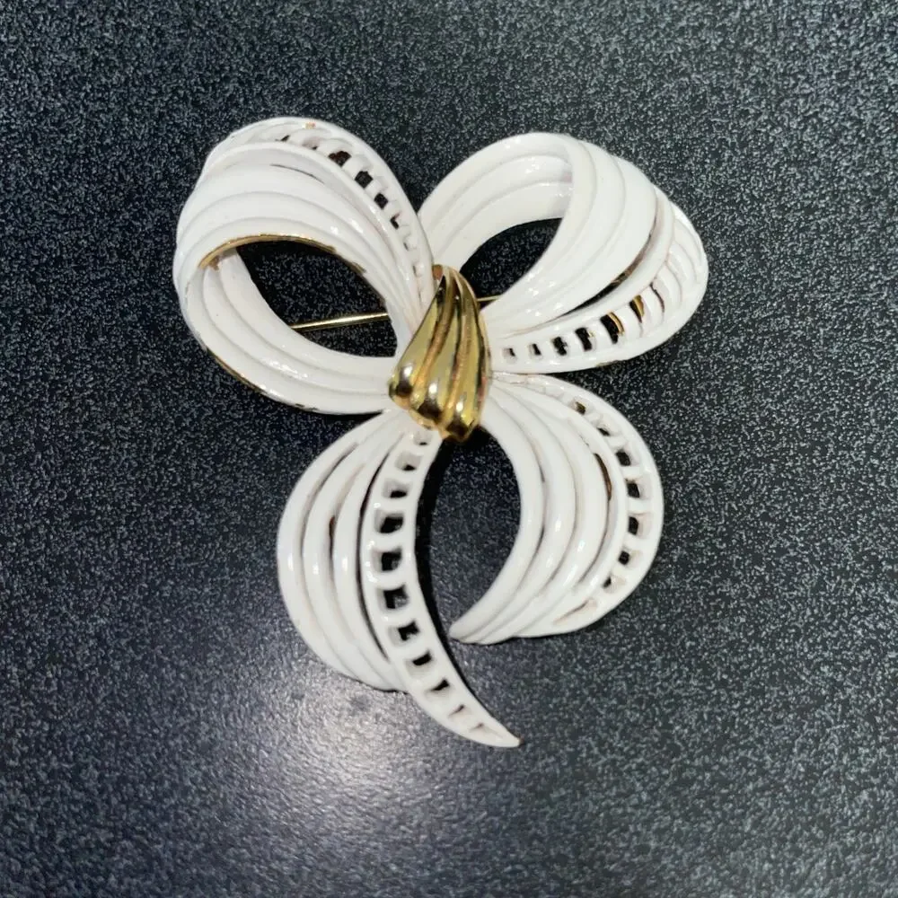 Vintage MONET Gold Tone, White Enamel Fancy Bow Design Brooch Stamped